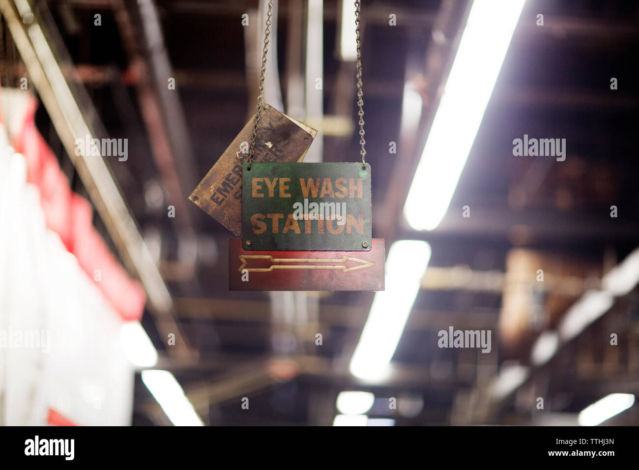 Signboard hanging in factory Stock Photo