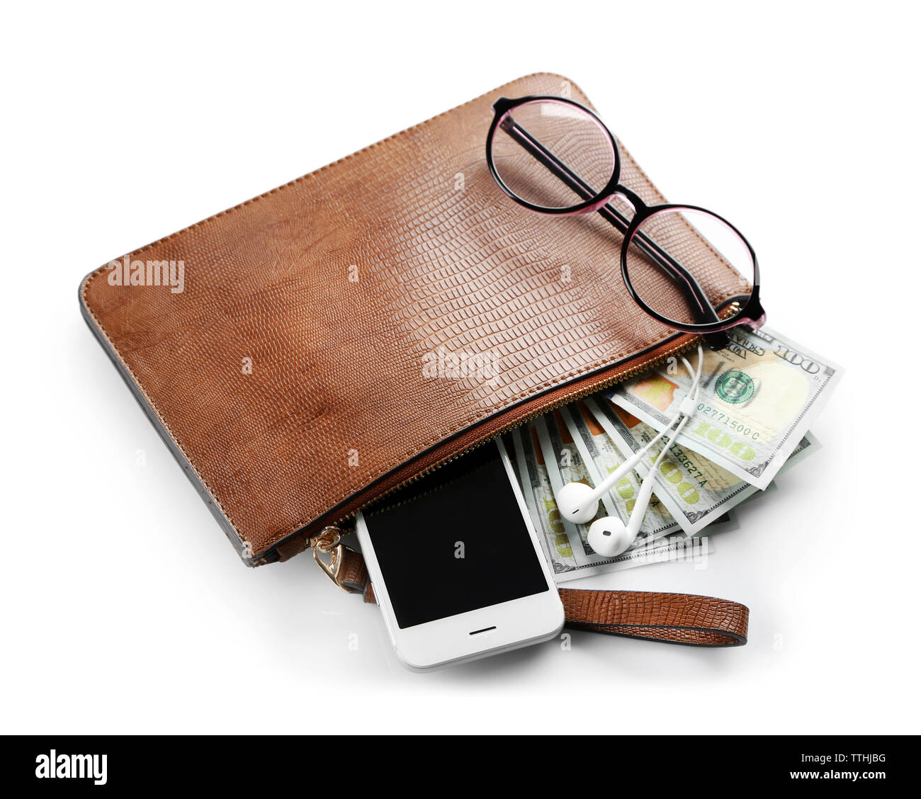 Leather purse with mobile phone, glasses and dollar banknotes, isolated on white Stock Photo