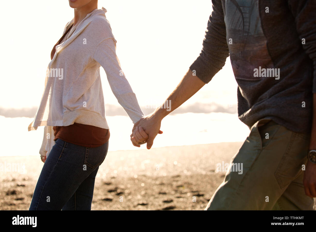 Old couple holding hands walking hi-res stock photography and images ...