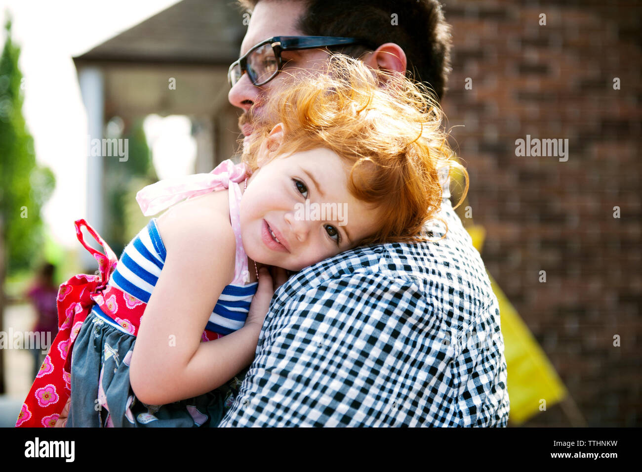 Close-up of father carrying daughter Stock Photo