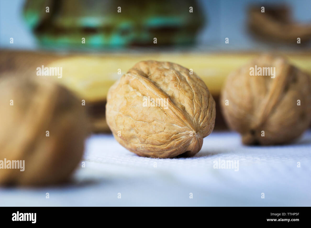 Close-up of walnuts on table at home Stock Photo