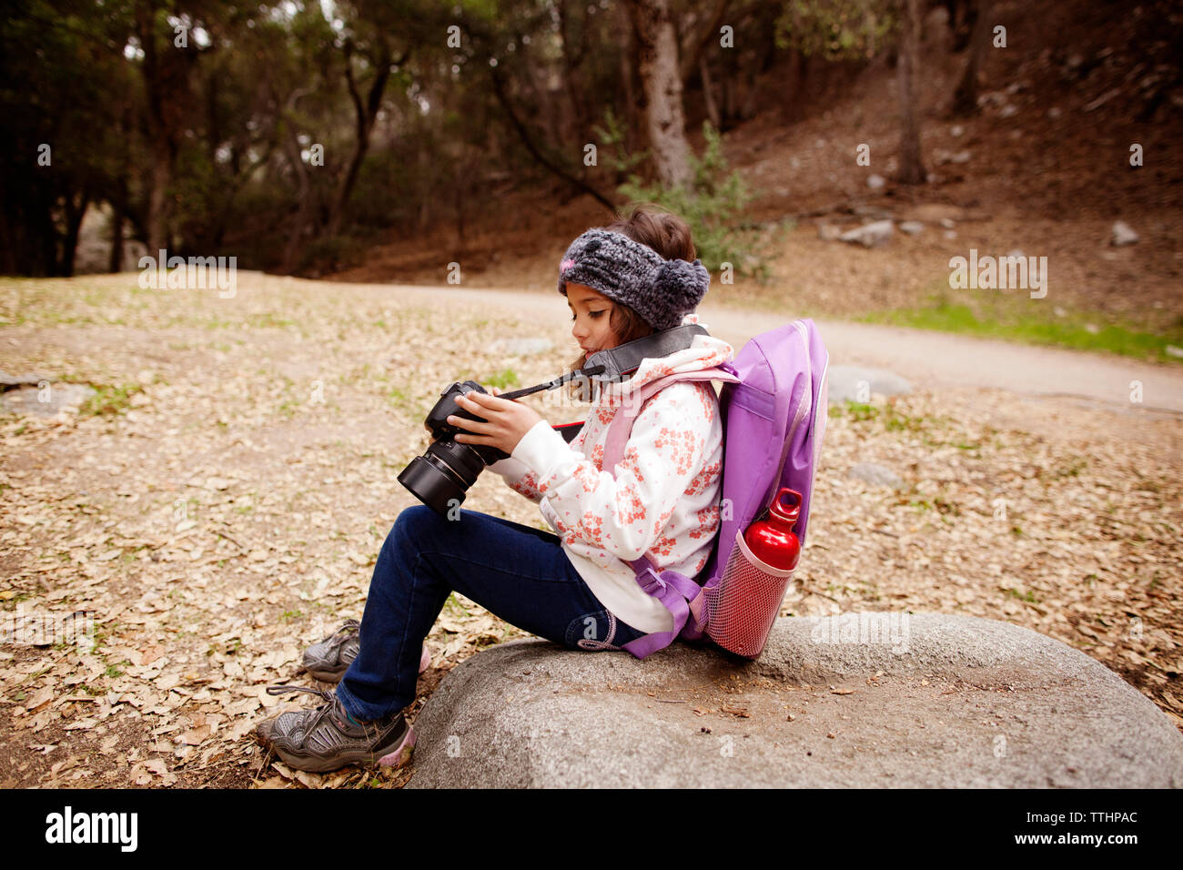 Sitting down on rock hi-res stock photography and images - Alamy