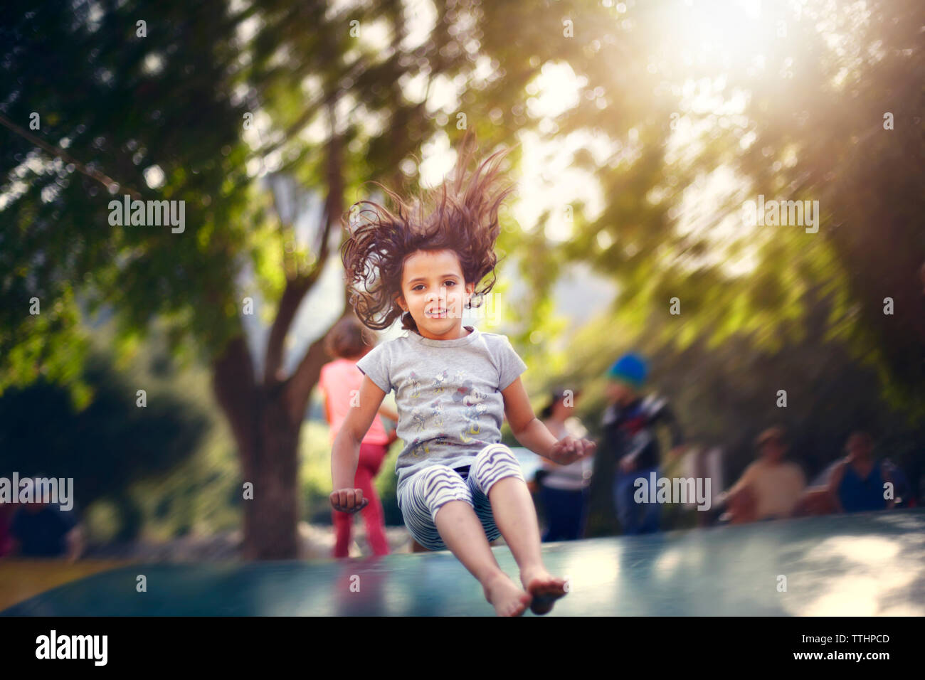 Girl jumping on trampoline hires stock photography and images Alamy