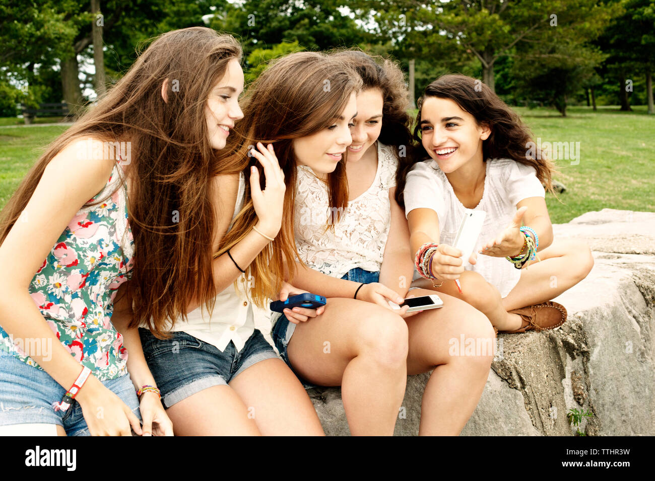 Studio Photo Of Four Pretty Teenage Girls In Tight Group On White. Stock  Photo, Picture and Royalty Free Image. Image 18663846.