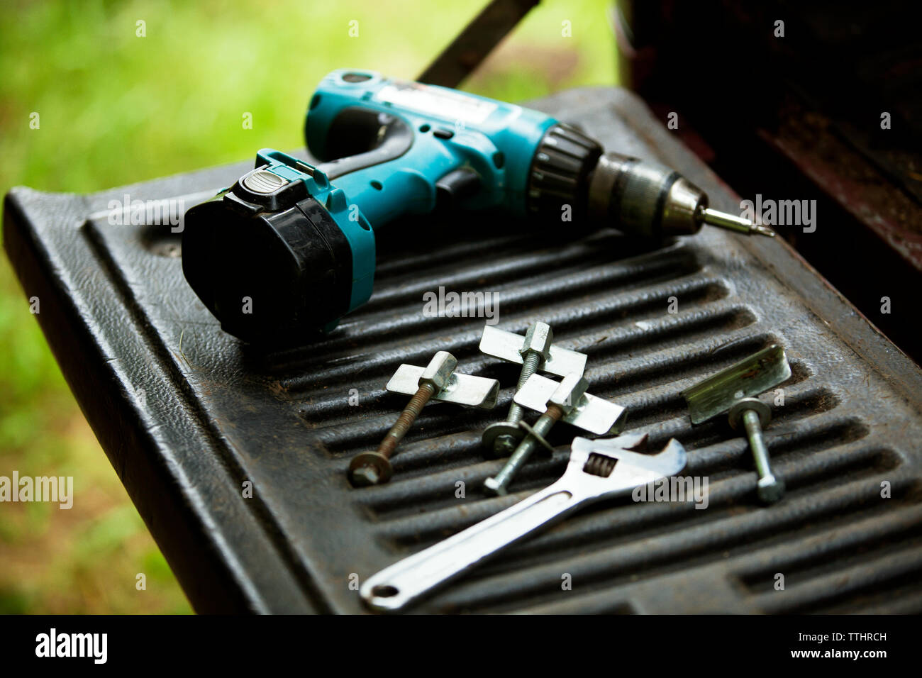 High angle view of drill machine and work tool on vehicle at forest Stock Photo