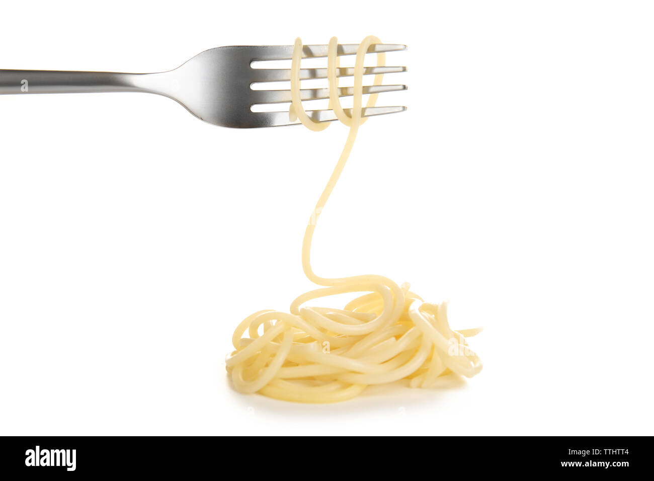 Spaghetti rolled on fork isolated on white Stock Photo Alamy