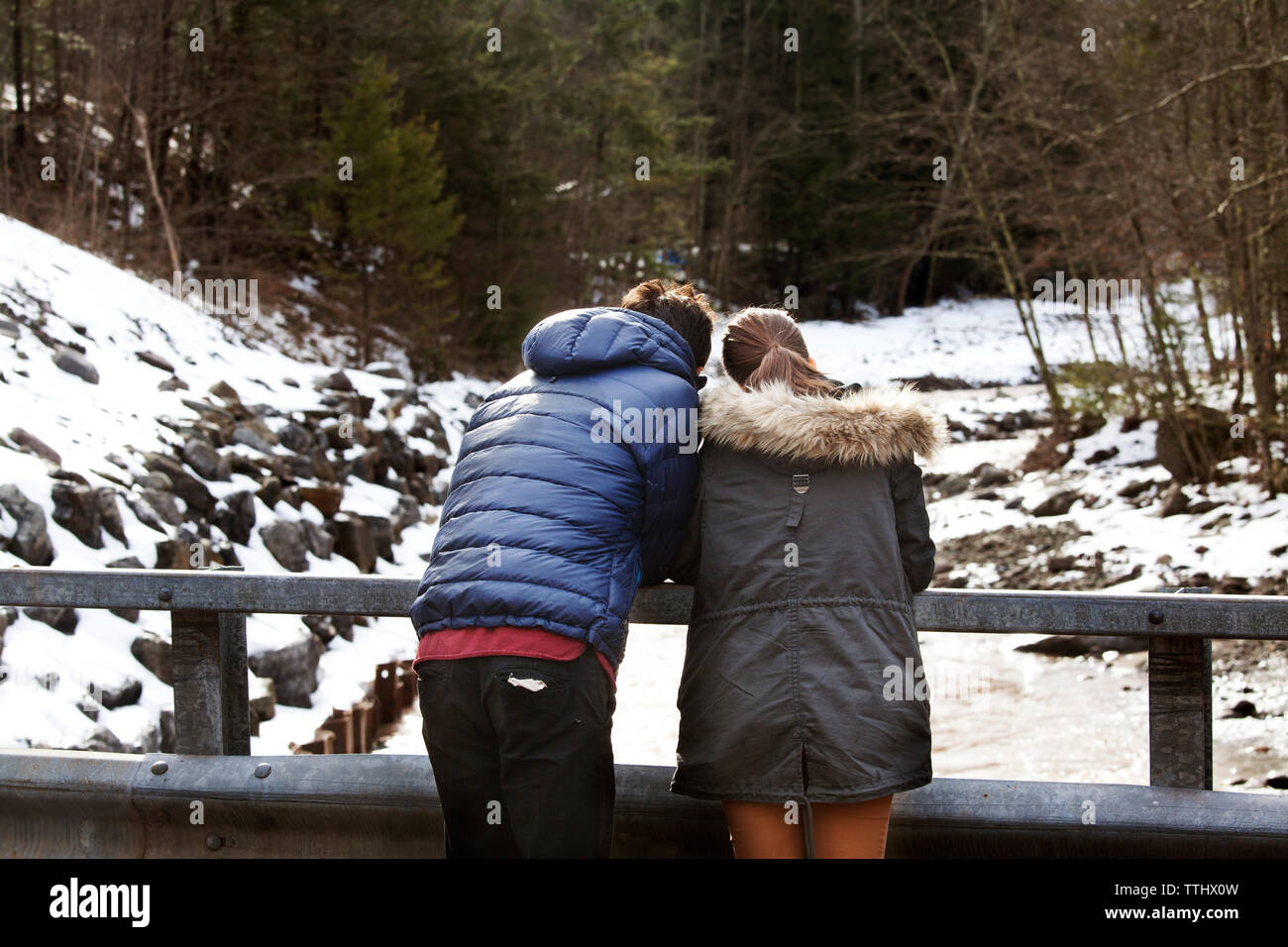 Rear view man standing railing hi-res stock photography and images - Alamy