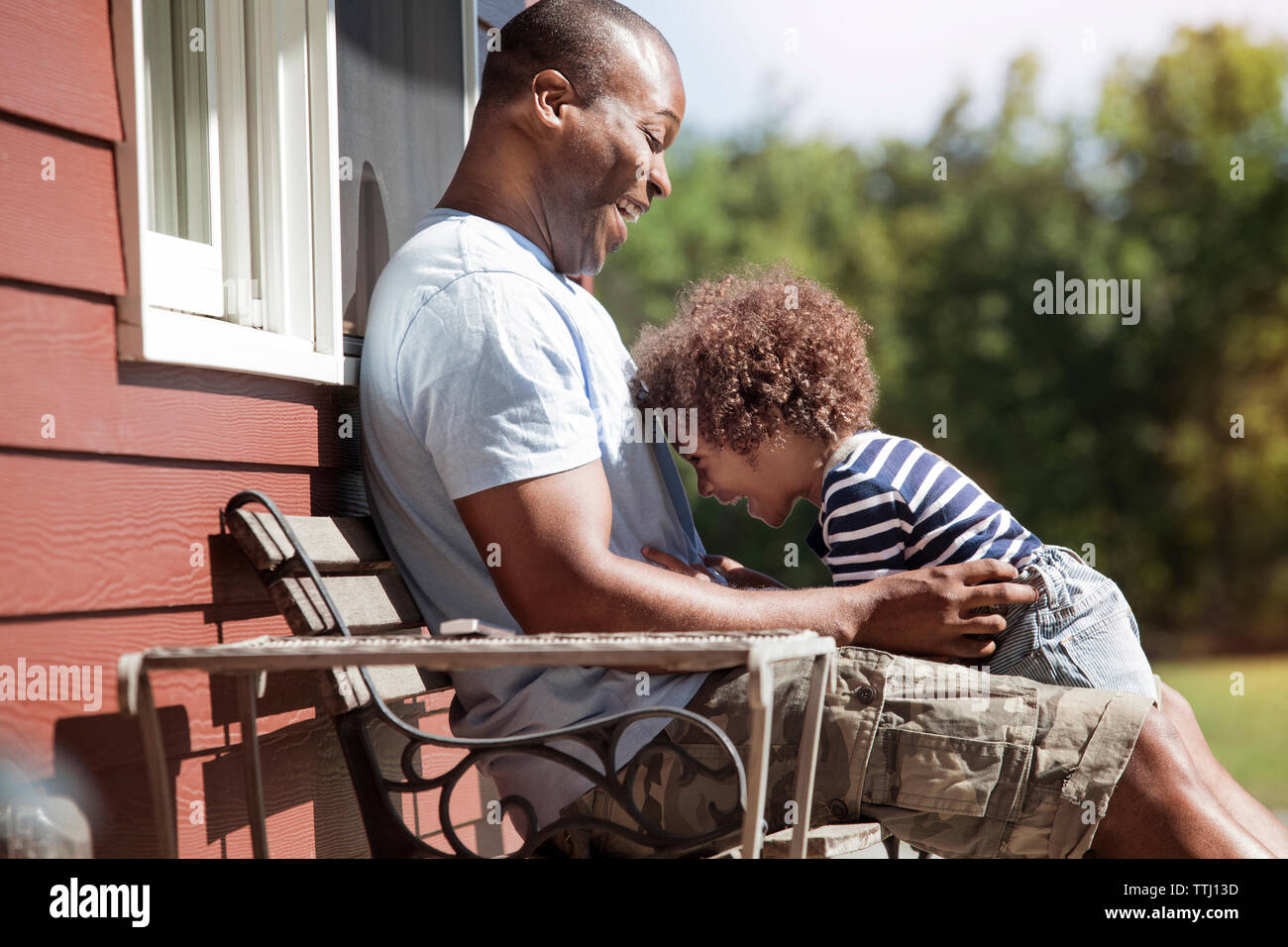 Happy family enjoying at backyard Stock Photo