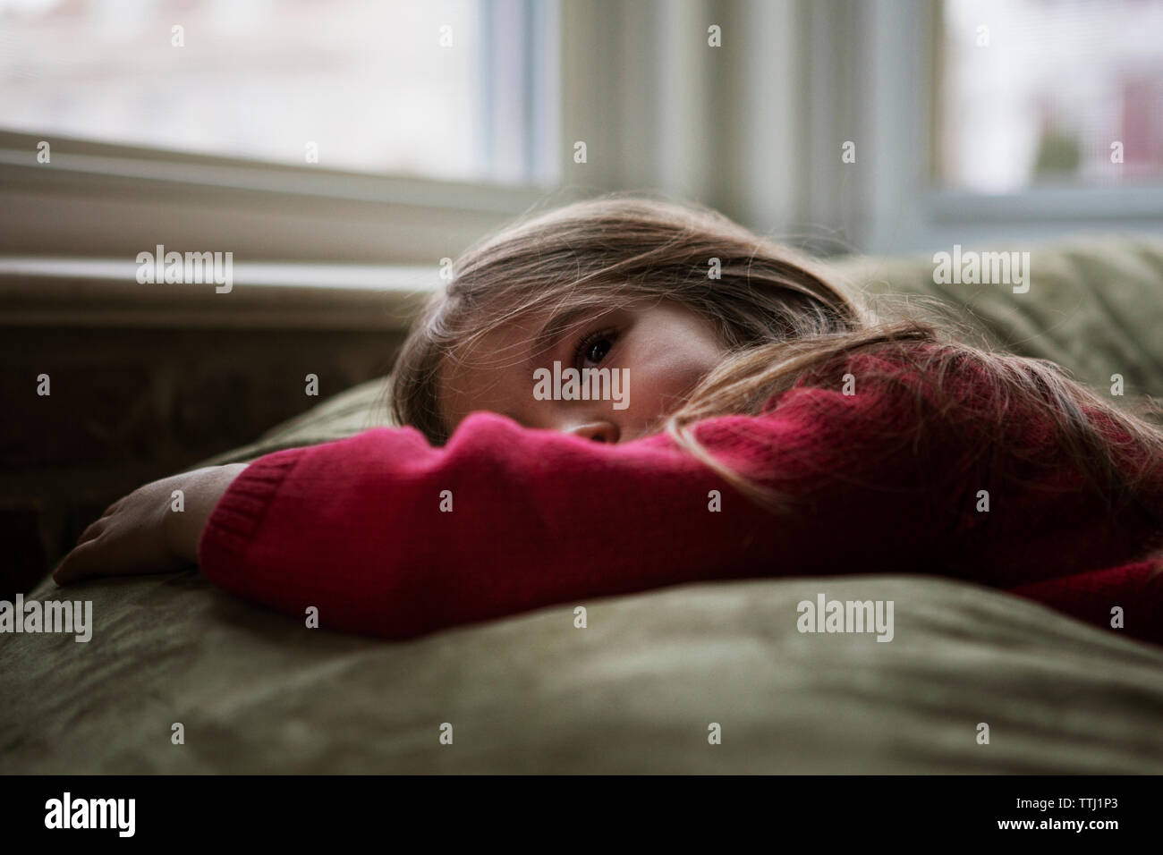 Girl Lying On Bean Bag High Resolution Stock Photography and Images - Alamy