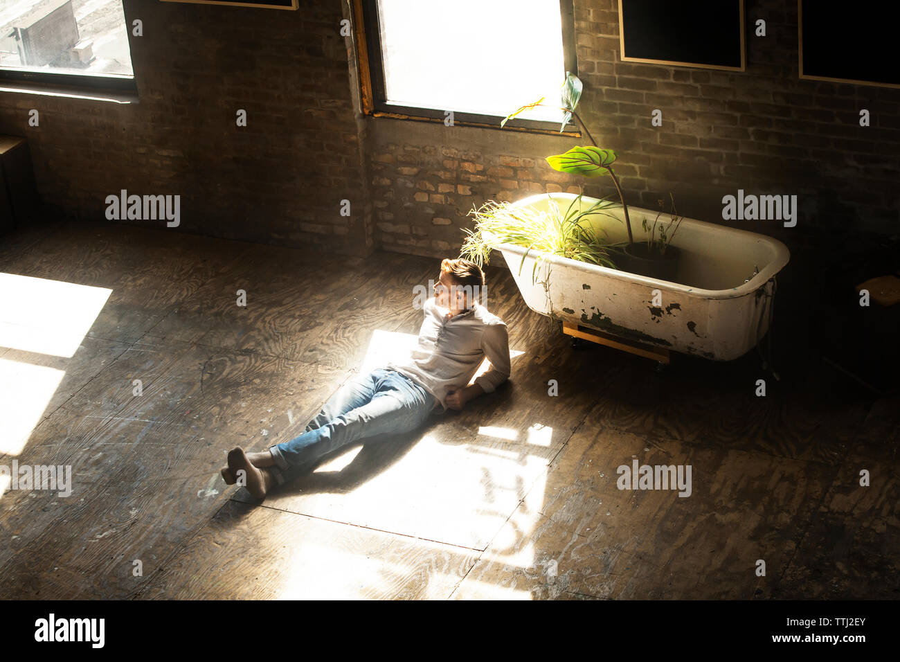 Reclining man hi-res stock photography and images - Alamy