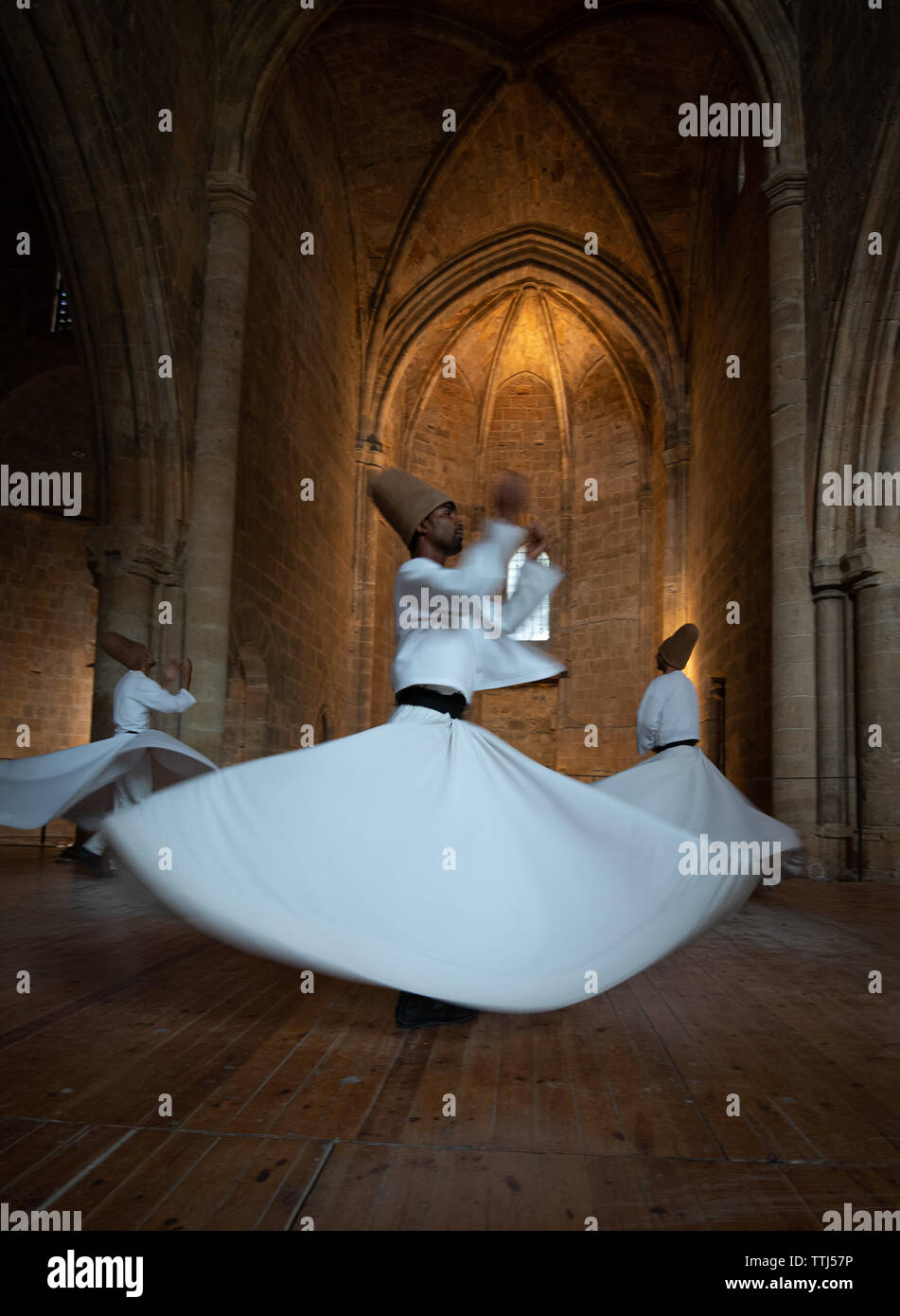 Nicosia, Cyprus, June 5 2019: Group of Dervishes performing the traditional and religious whirling dance or Sufi whirling Stock Photo