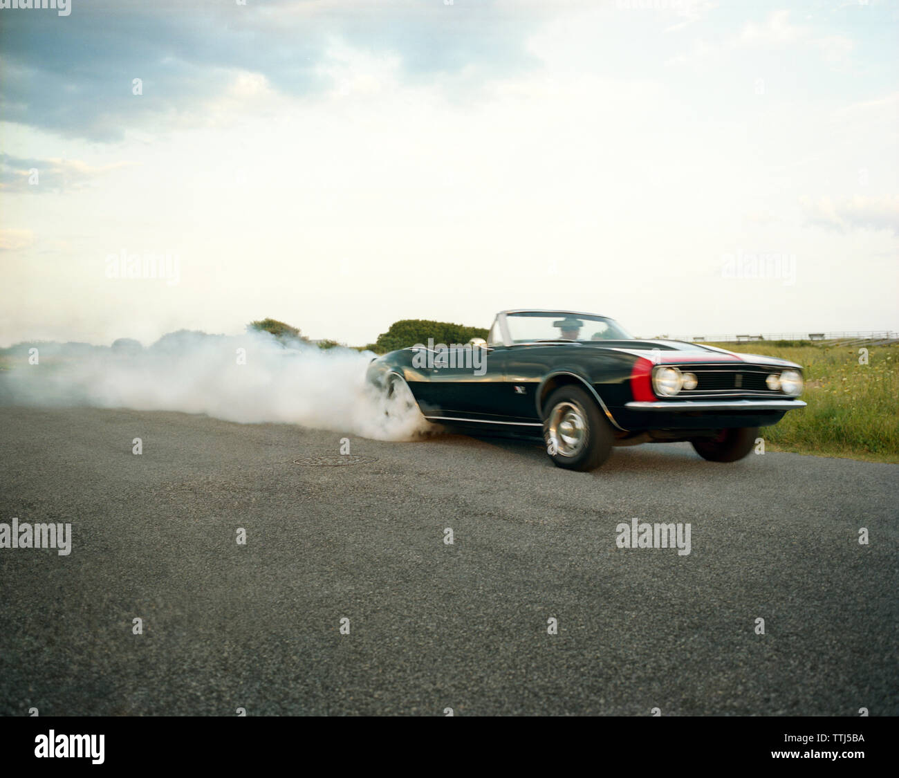 Black old man driving car hi-res stock photography and images - Alamy