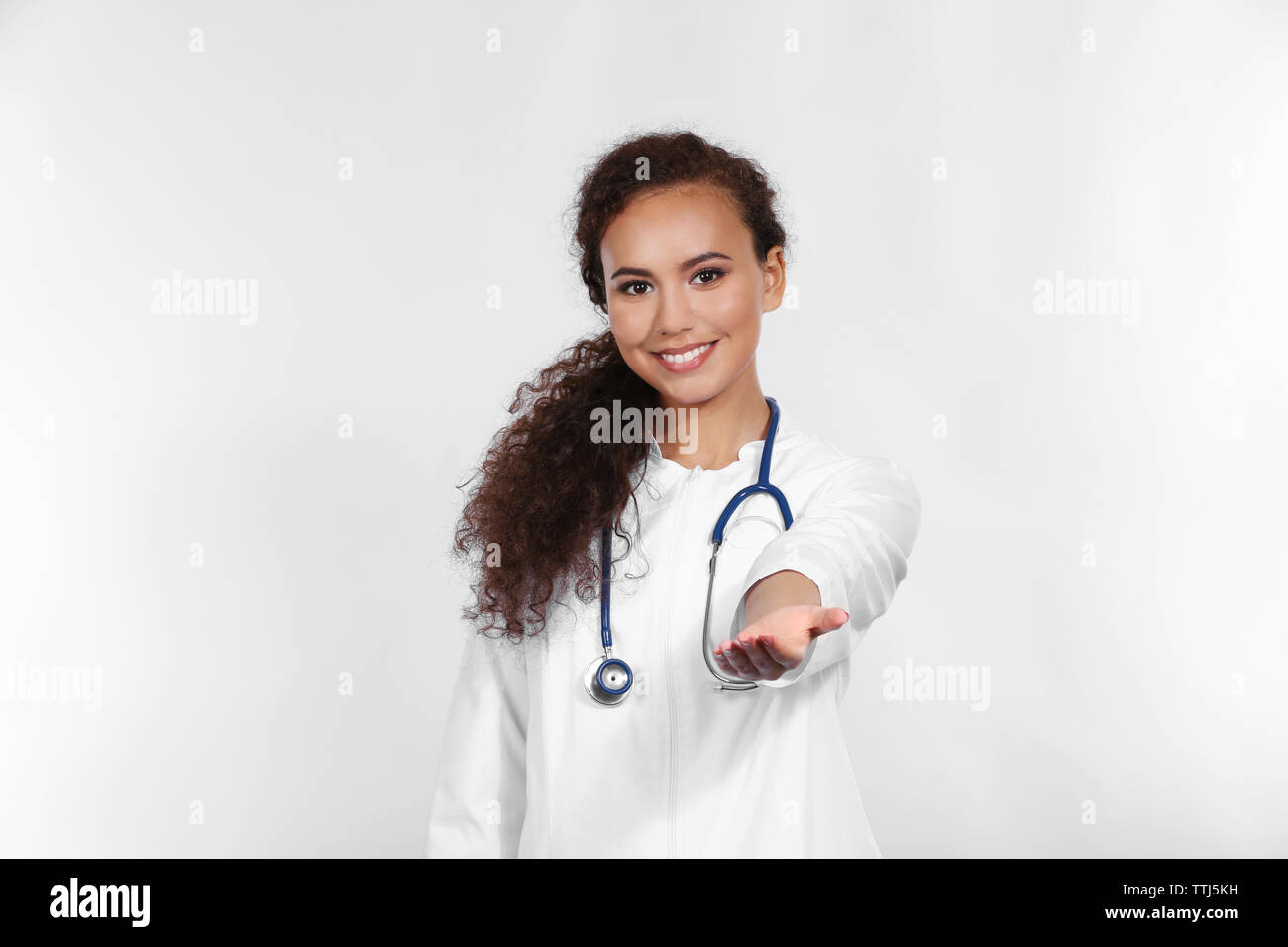 African american doctor hold hi-res stock photography and images - Alamy