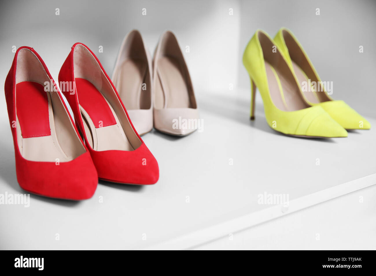 Female high heel shoes in wardrobe Stock Photo
