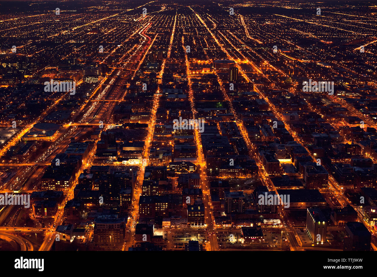 Aerial view of illuminated city at night Stock Photo - Alamy