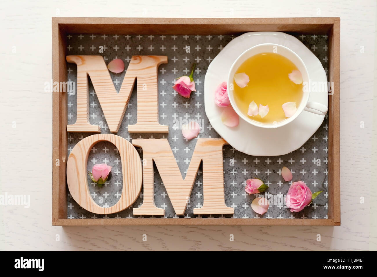 Cup of tea and card with words I love you Mom on table. Mother's Day  celebration Stock Photo - Alamy