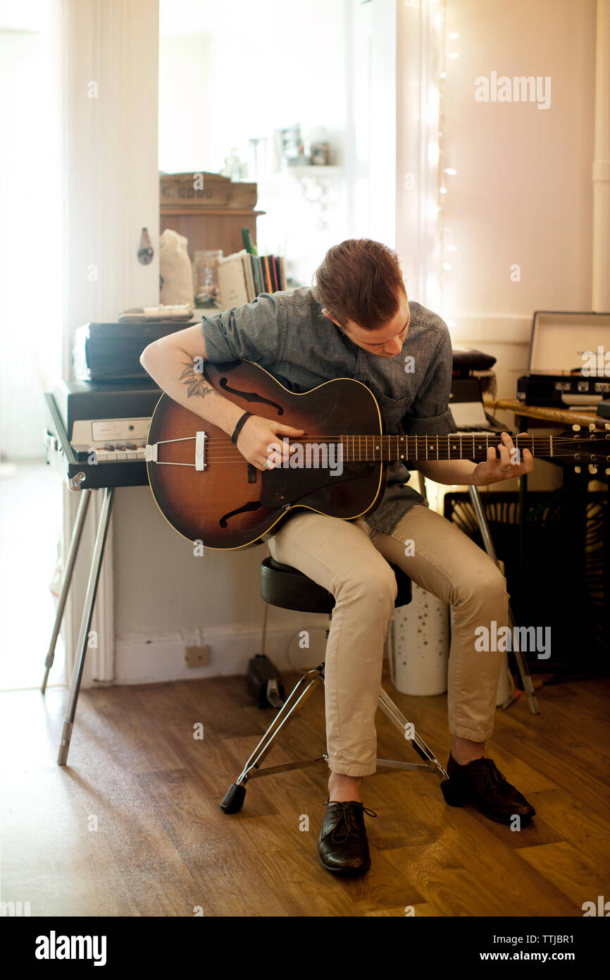 Person practicing instrument hi-res stock photography and images - Alamy