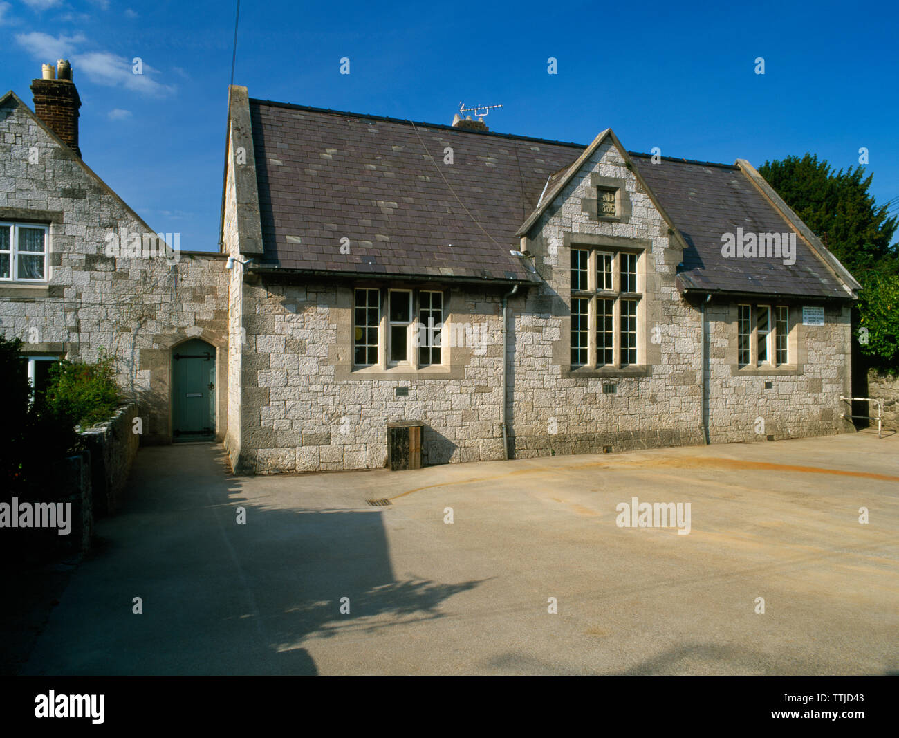 View NE of Tremeirchion Victorian National School & schoolhouse, Denbighshire, UK, built 1865 at a cost of c £800. Ysgol Tremeirchion is still in use. Stock Photo