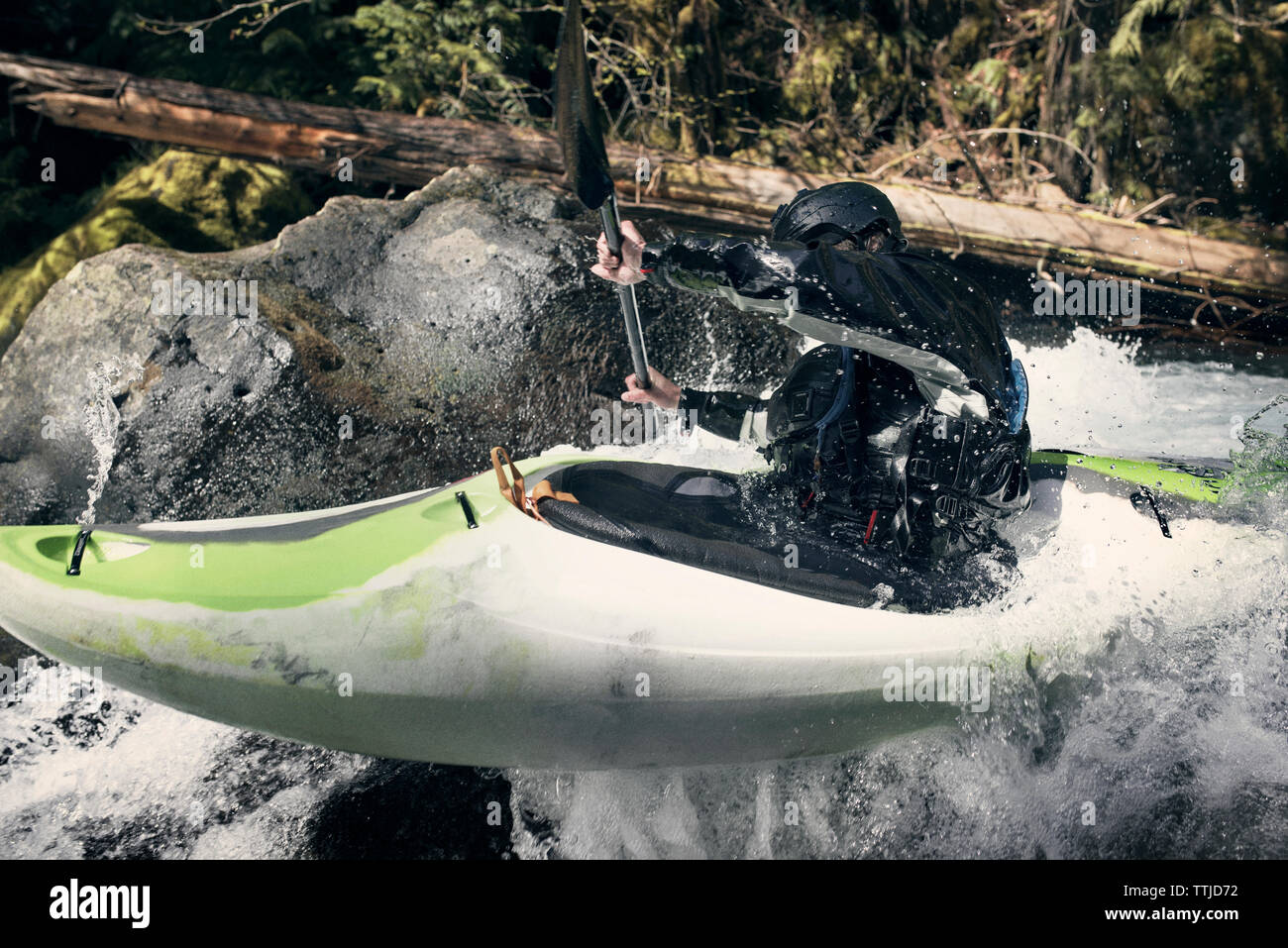 Close-up of man kayaking in river Stock Photo