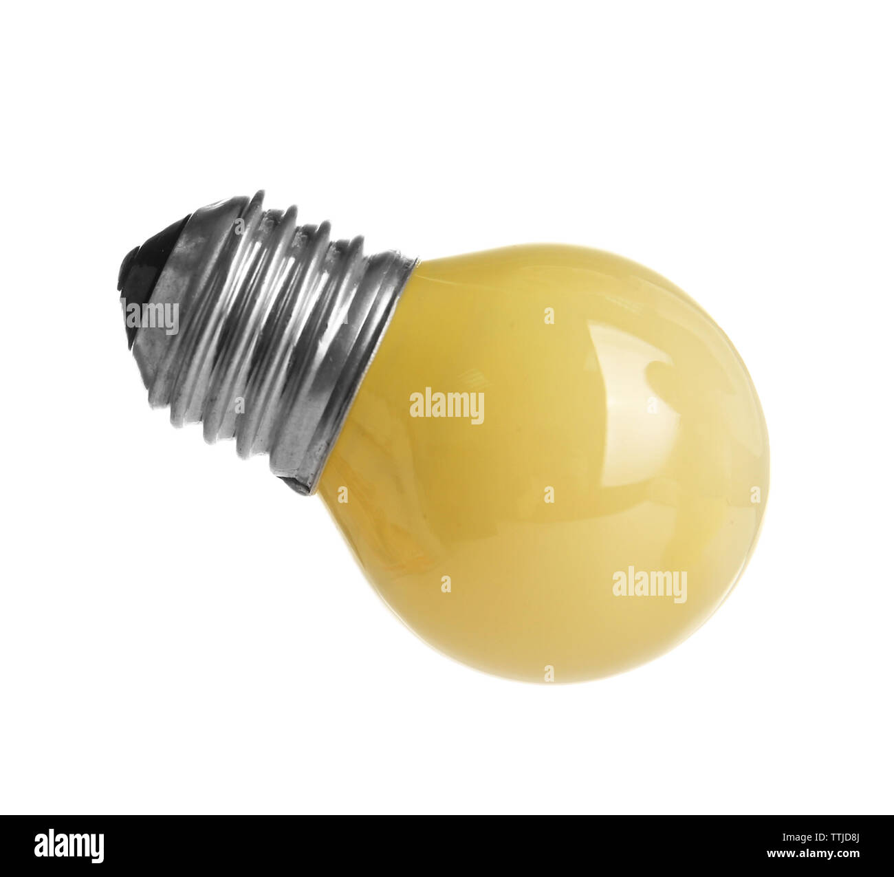 Decorative yellow light bulb, isolated on white Stock Photo - Alamy