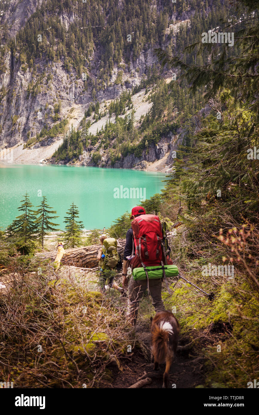Man woman dog hiking mountain hi-res stock photography and images - Alamy