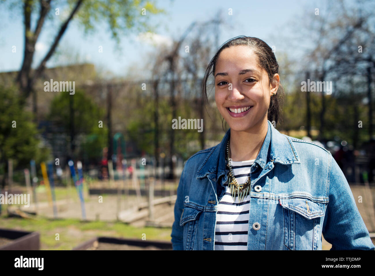Standing happy woman hi-res stock photography and images - Alamy