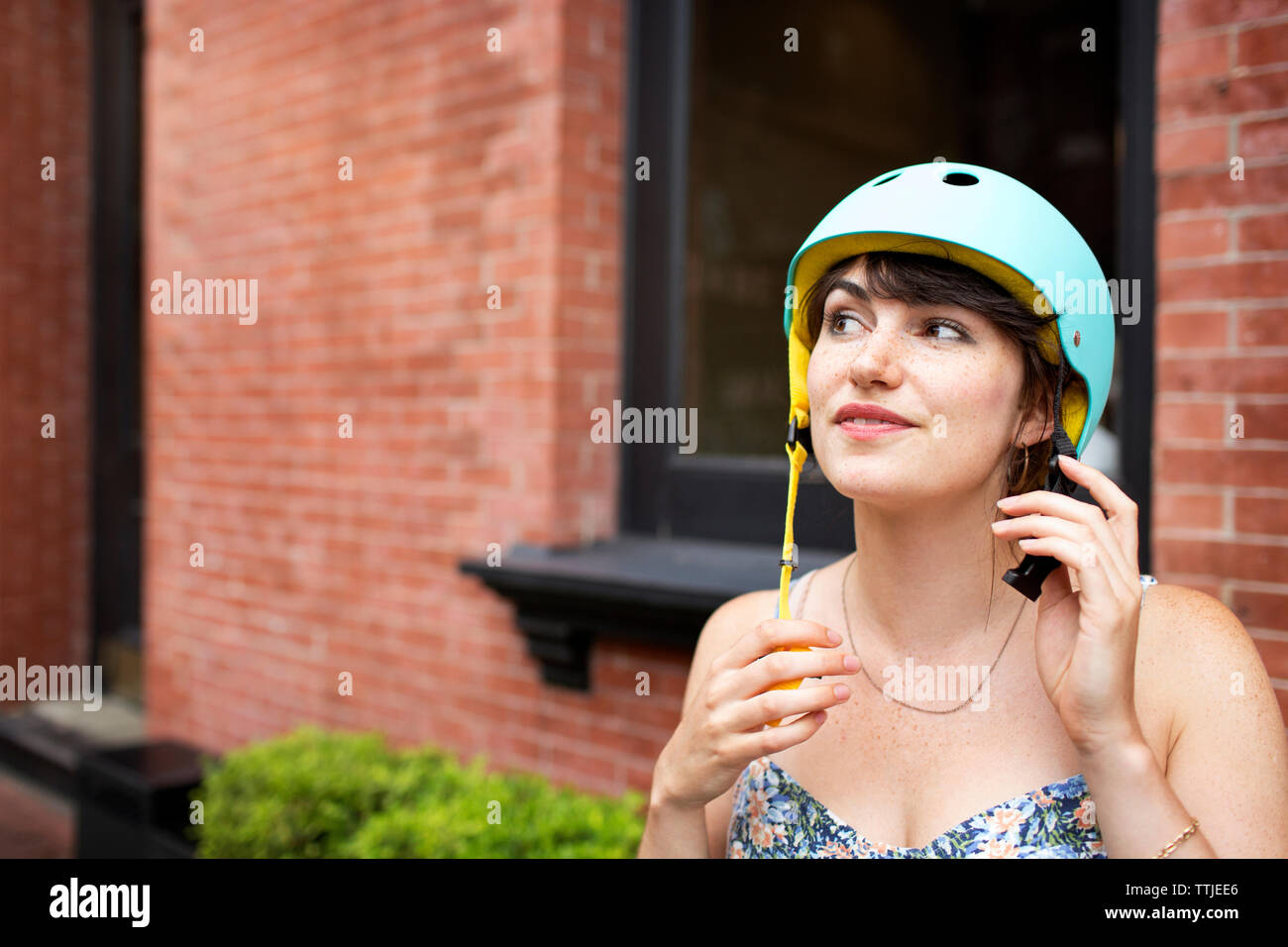 Woman holding helmet hi-res stock photography and images - Alamy