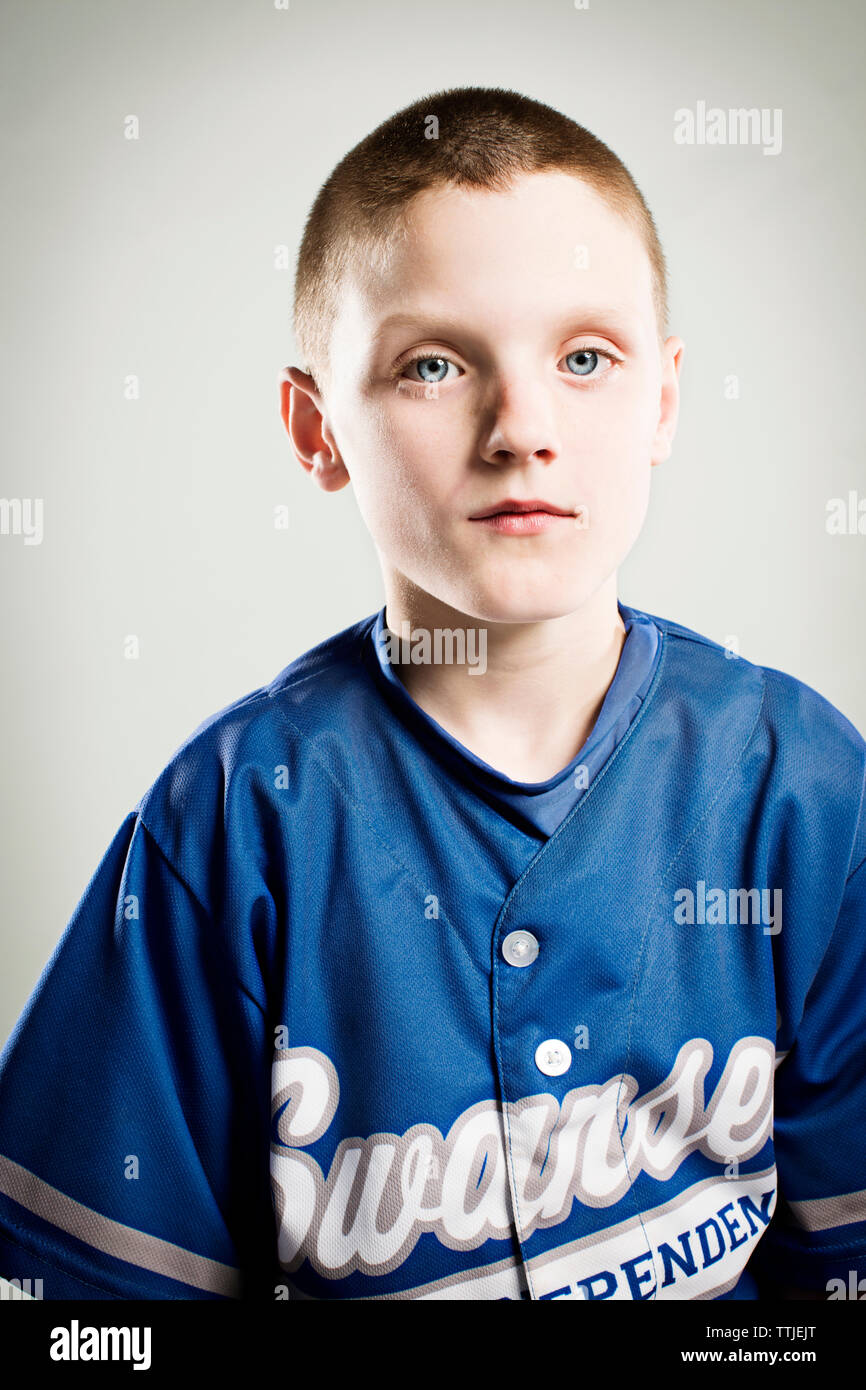Portrait of baseball player against white background Stock Photo Alamy