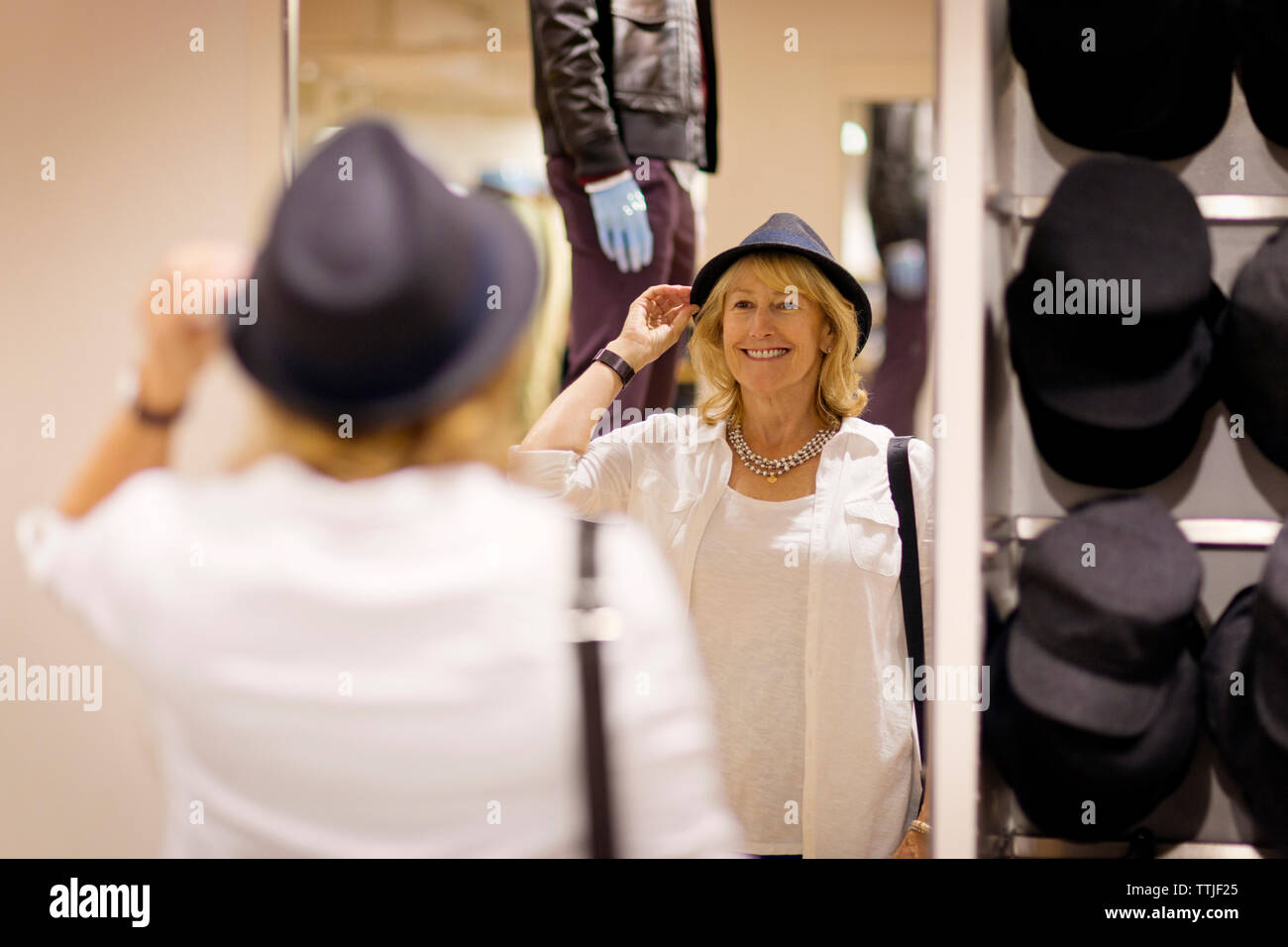 Woman wearing hats hi-res stock photography and images - Alamy