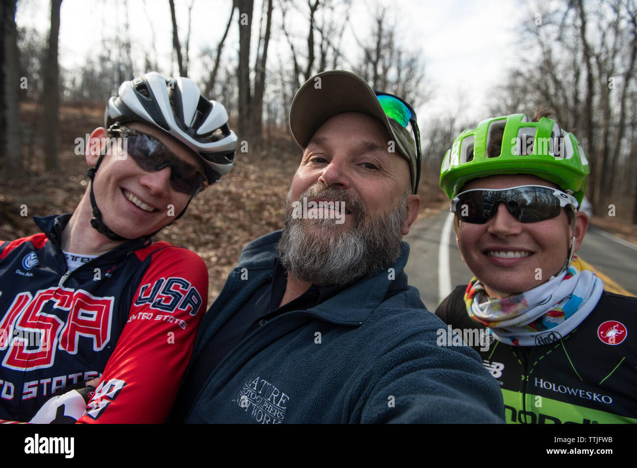 UNITED STATES - December 8, 2015: Pro cyclist Justin Mauch photographer Doug 'grizzly' Graham and Joe Dombrowski during a break in their ride across M Stock Photo