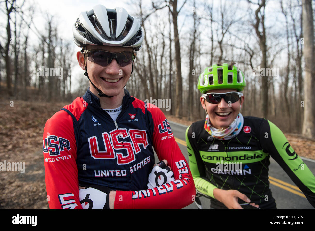 UNITED STATES - December 8, 2015: Pro cyclist Justin Mauch and Joe Dombrowski ride across Mt. Weather in the Blue Ridge Mountains of Virginia near Par Stock Photo