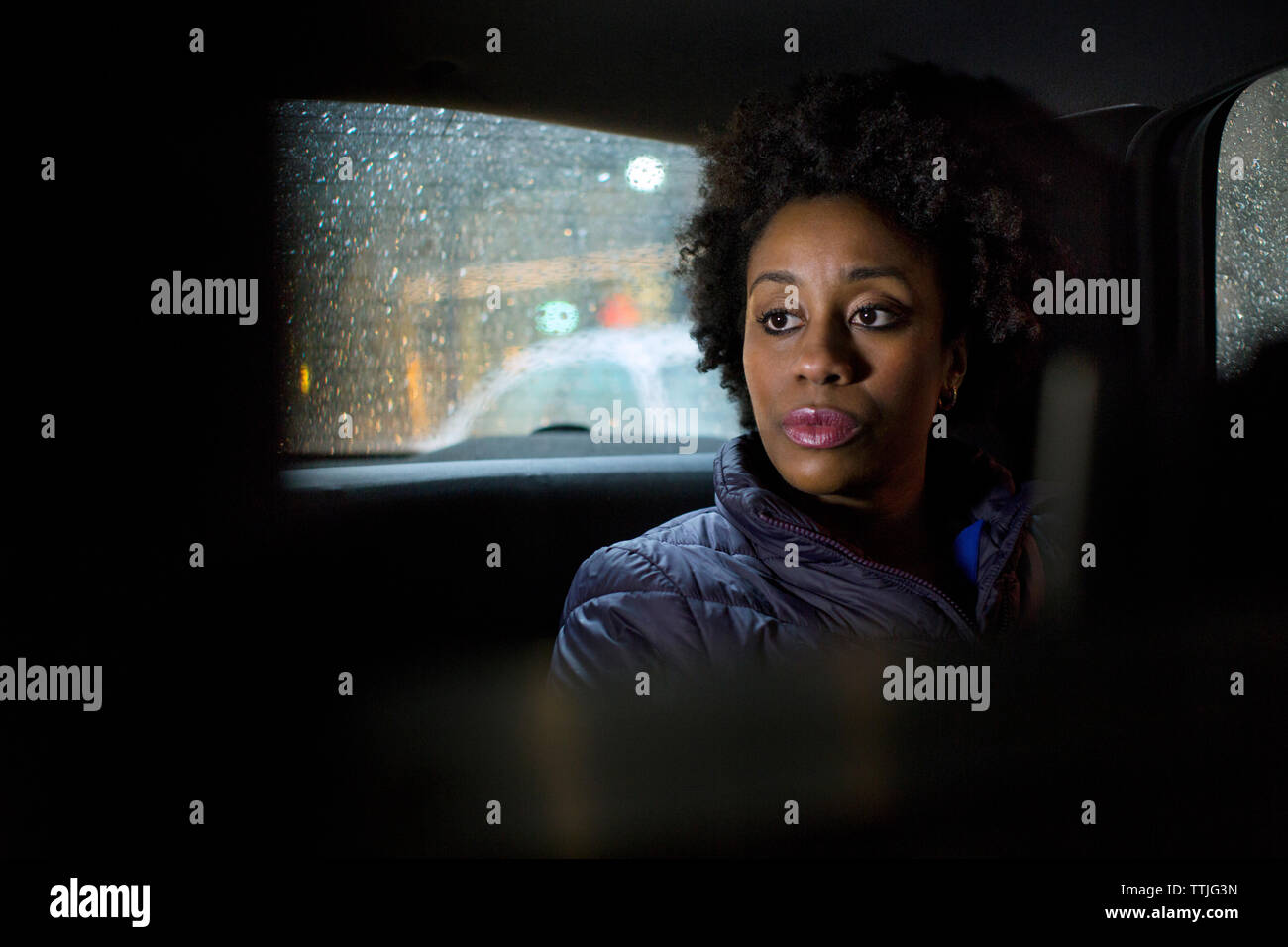 Sitting in car in rain hi-res stock photography and images - Alamy