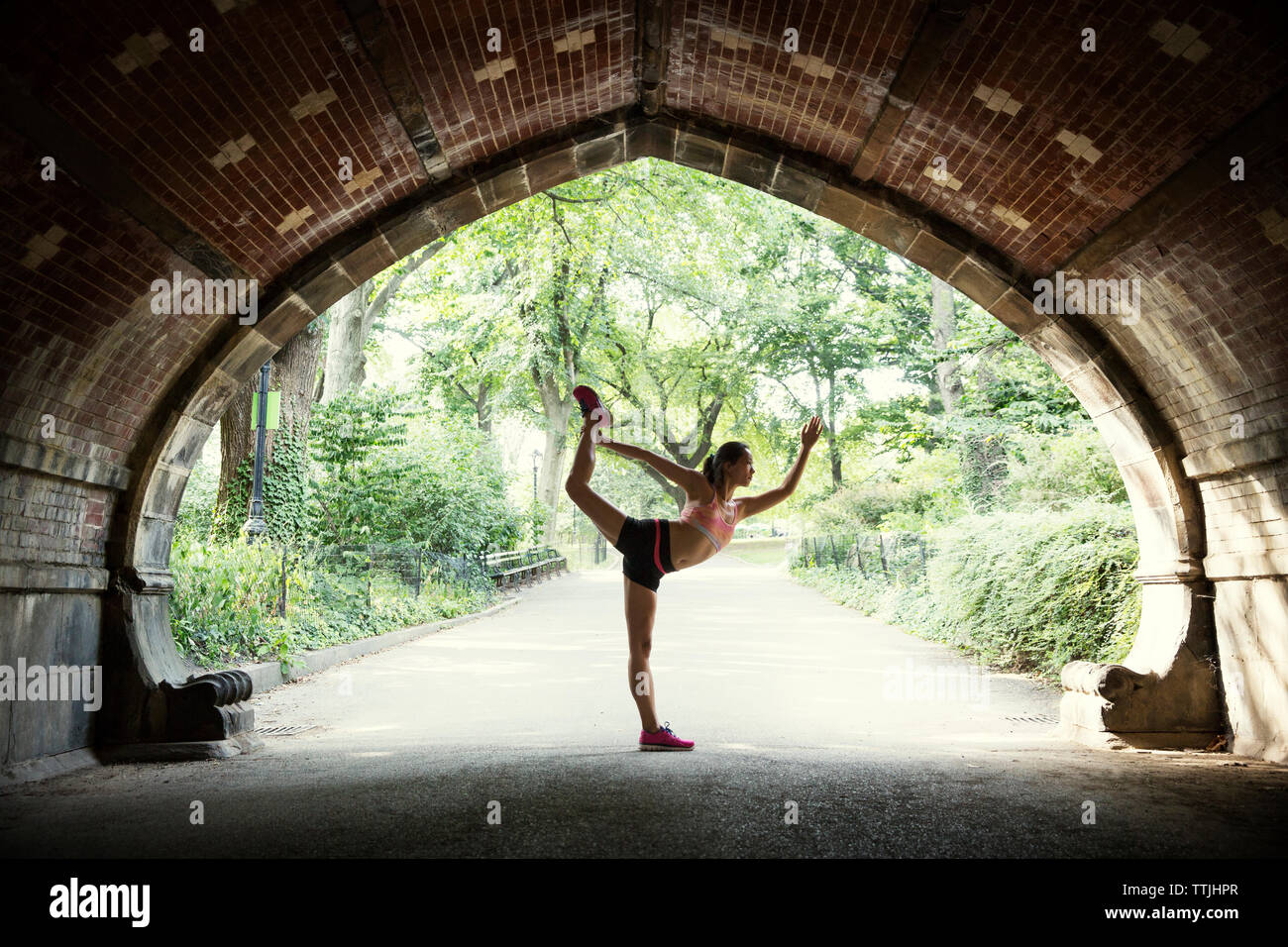 Indian woman standing in park hi-res stock photography and images - Alamy