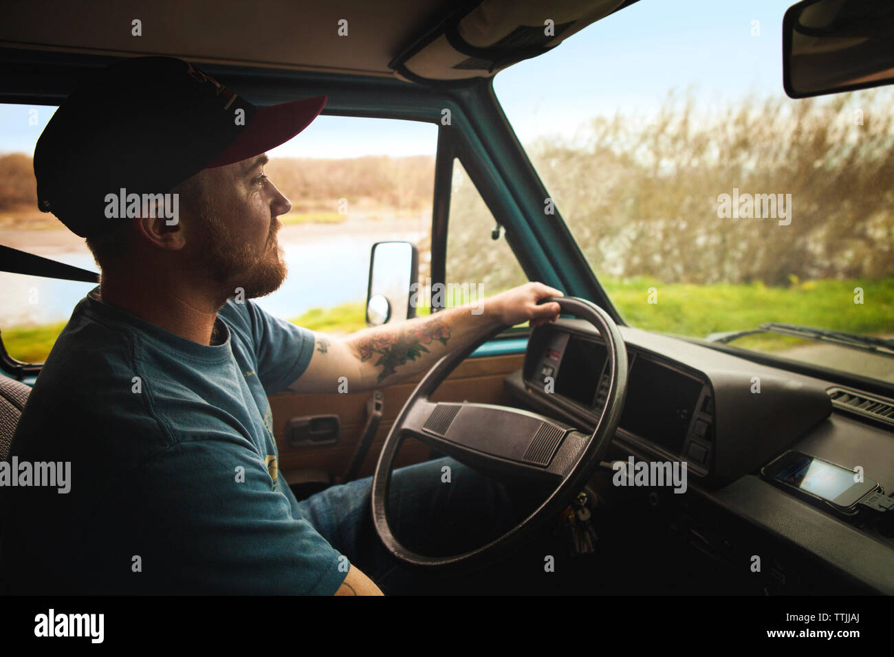 Man driving car Stock Photo
