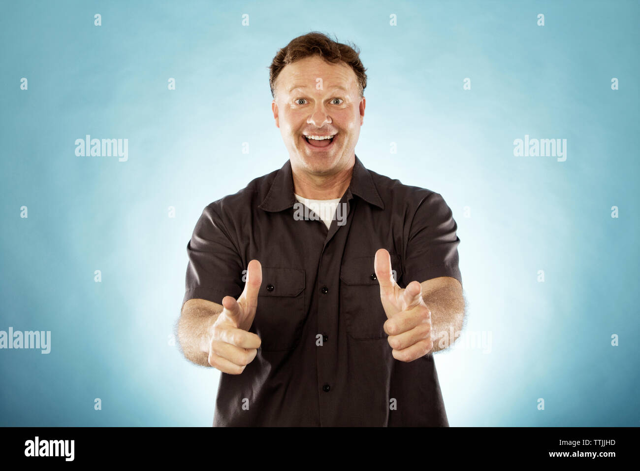 Old man pointing mouth hi-res stock photography and images - Alamy