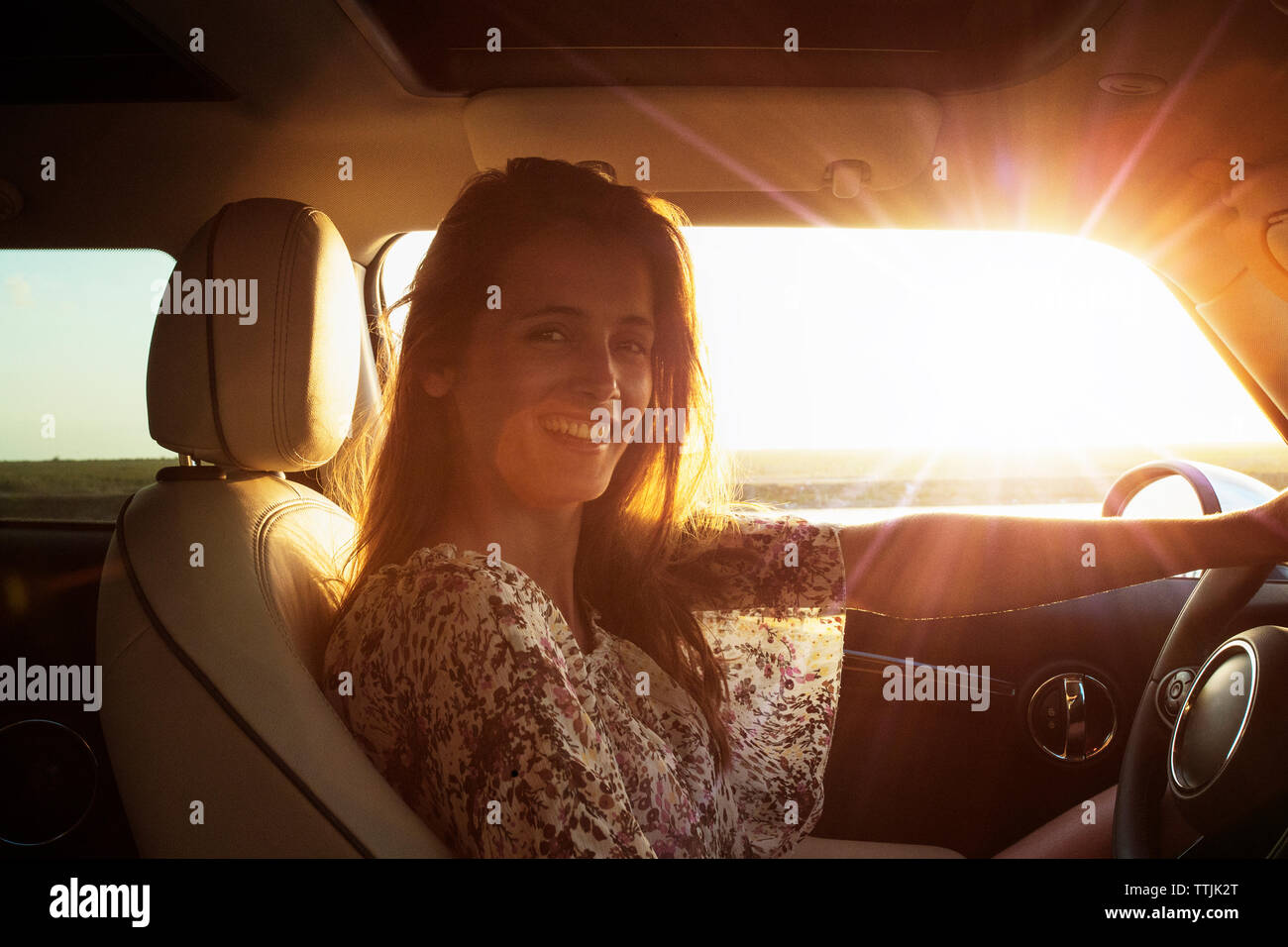 Car front view woman sitting hi-res stock photography and images - Alamy