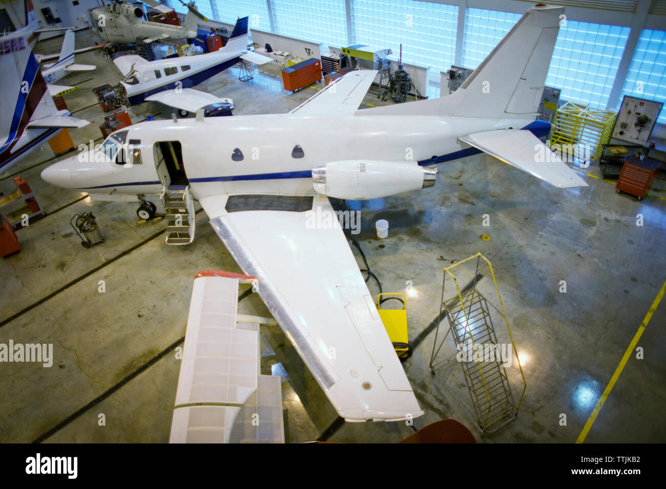 High angle view of aircraft in airplane hangar Stock Photo