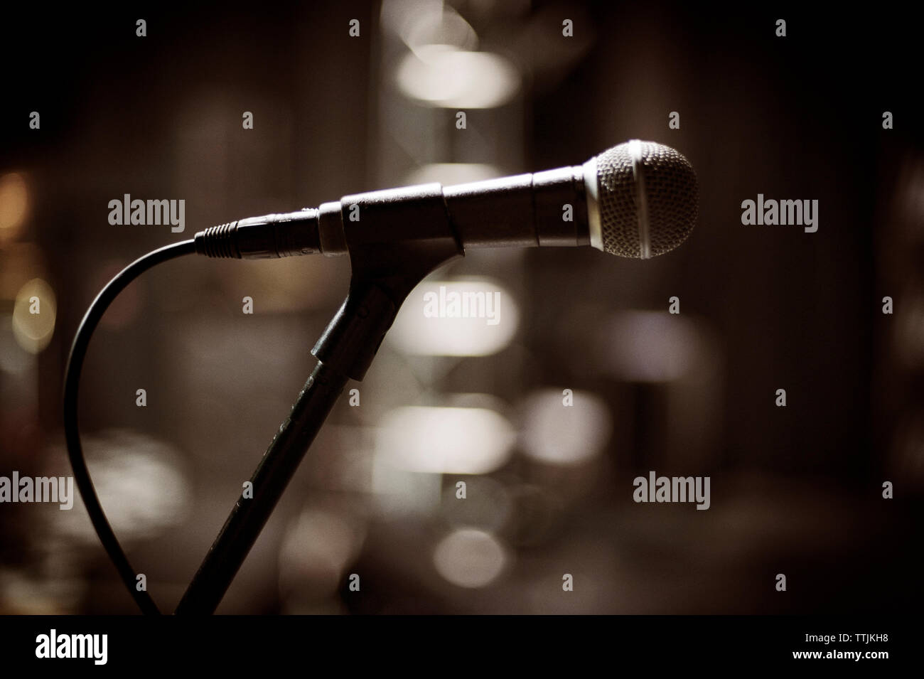 Microphone on stage Stock Photo Alamy