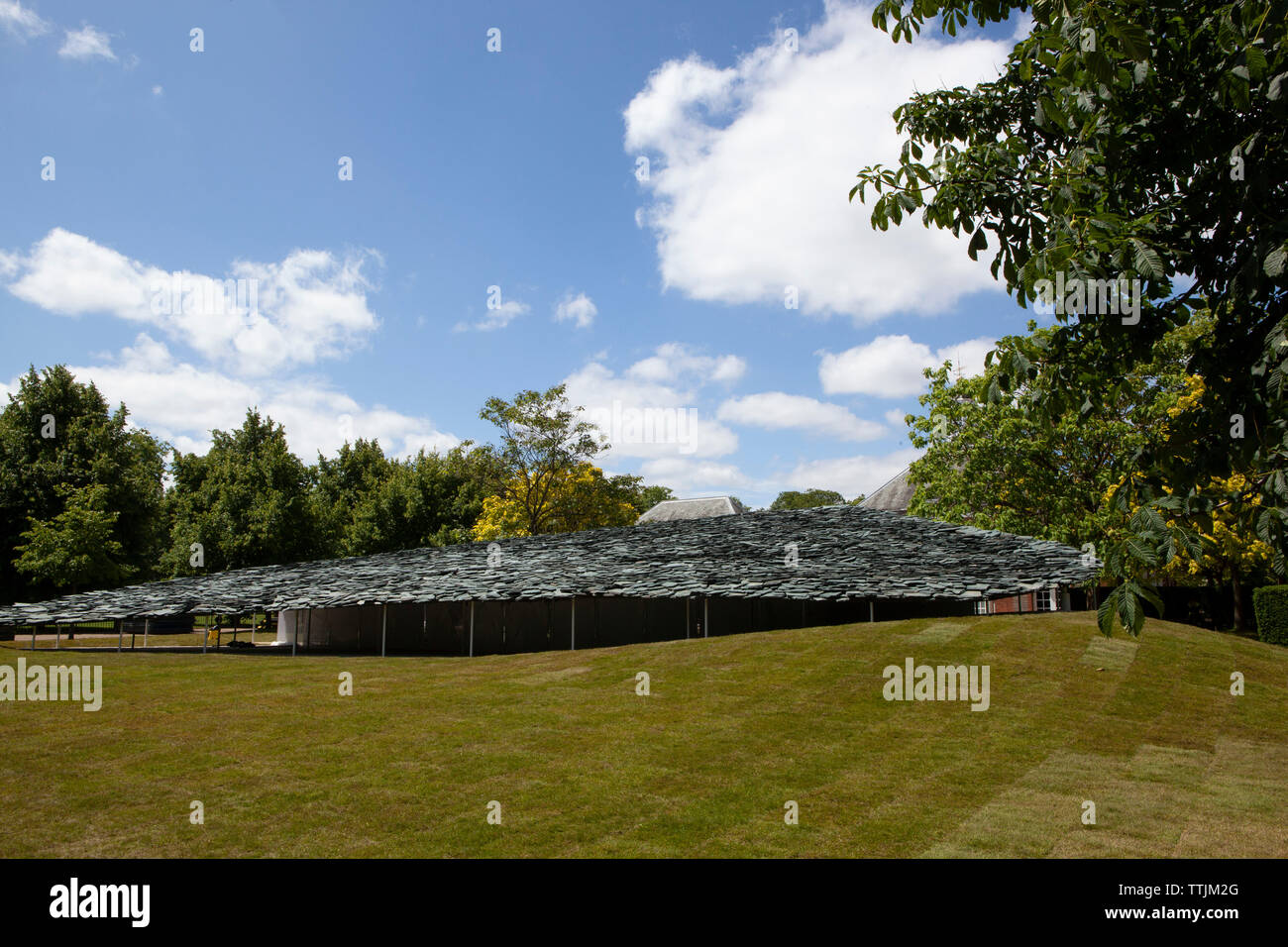 The Serpentine Gallery Summer Pavillion 2019 in London's Hyde Park is designed by Japanese architects Junya Ishigami + Associates and features a curve Stock Photo