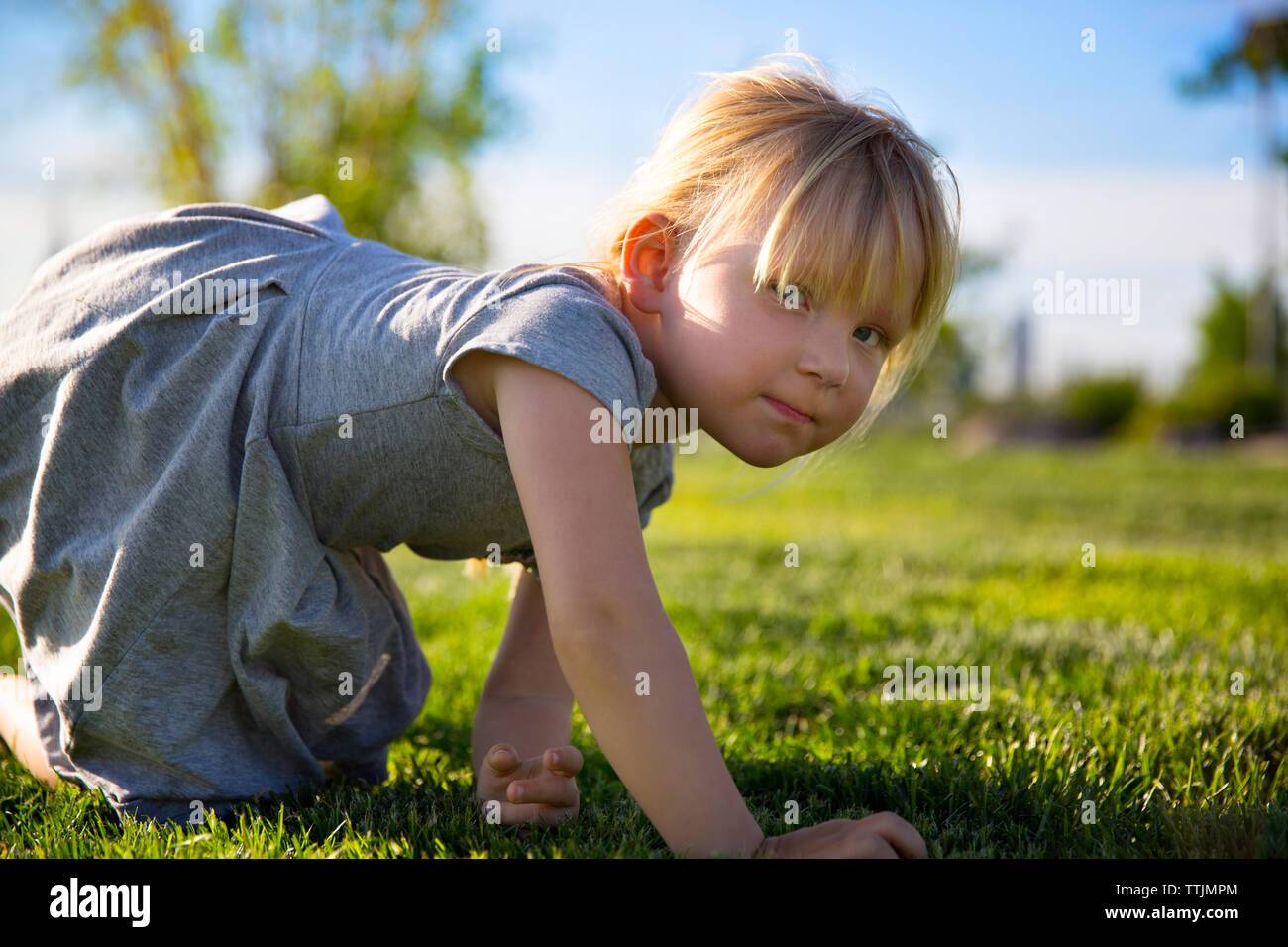 The kneeling girl hi-res stock photography and images - Alamy