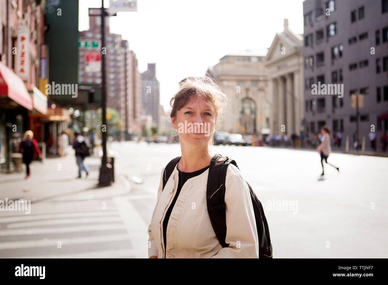 Mature woman standing street hi-res stock photography and images - Alamy