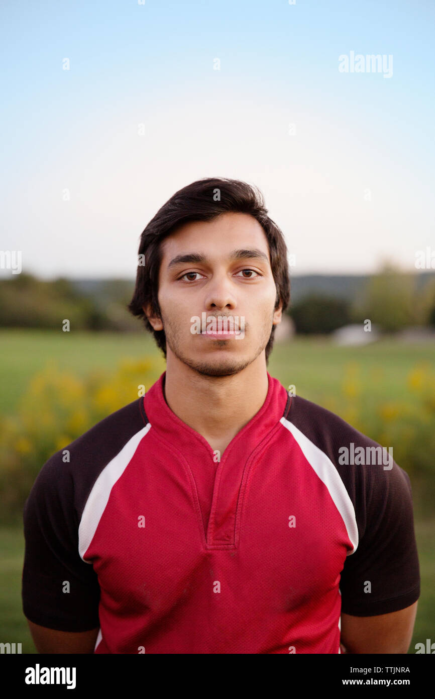 Portrait of rugby player standing on field Stock Photo Alamy
