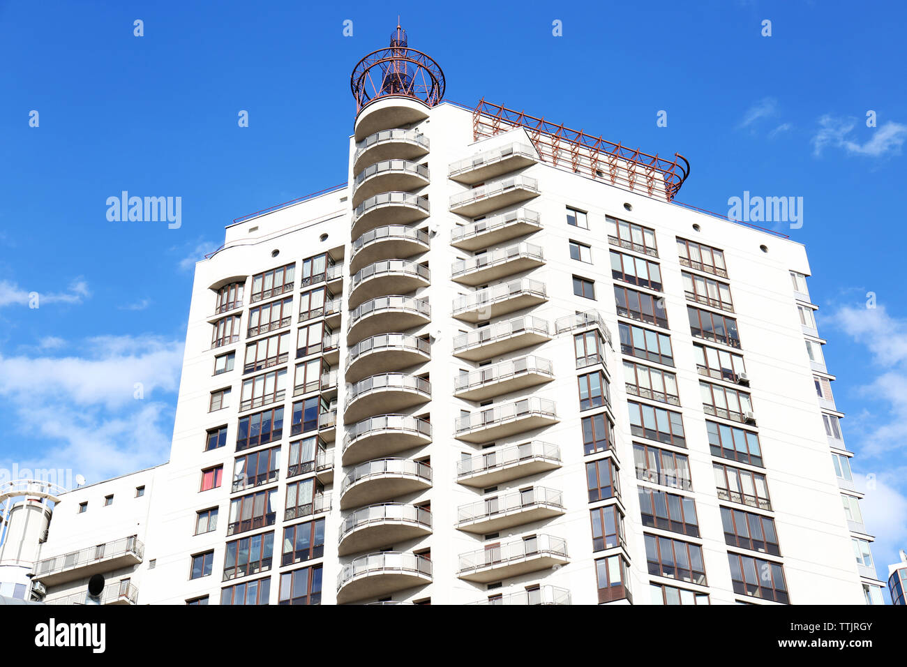 Office building on blue sky background Stock Photo - Alamy