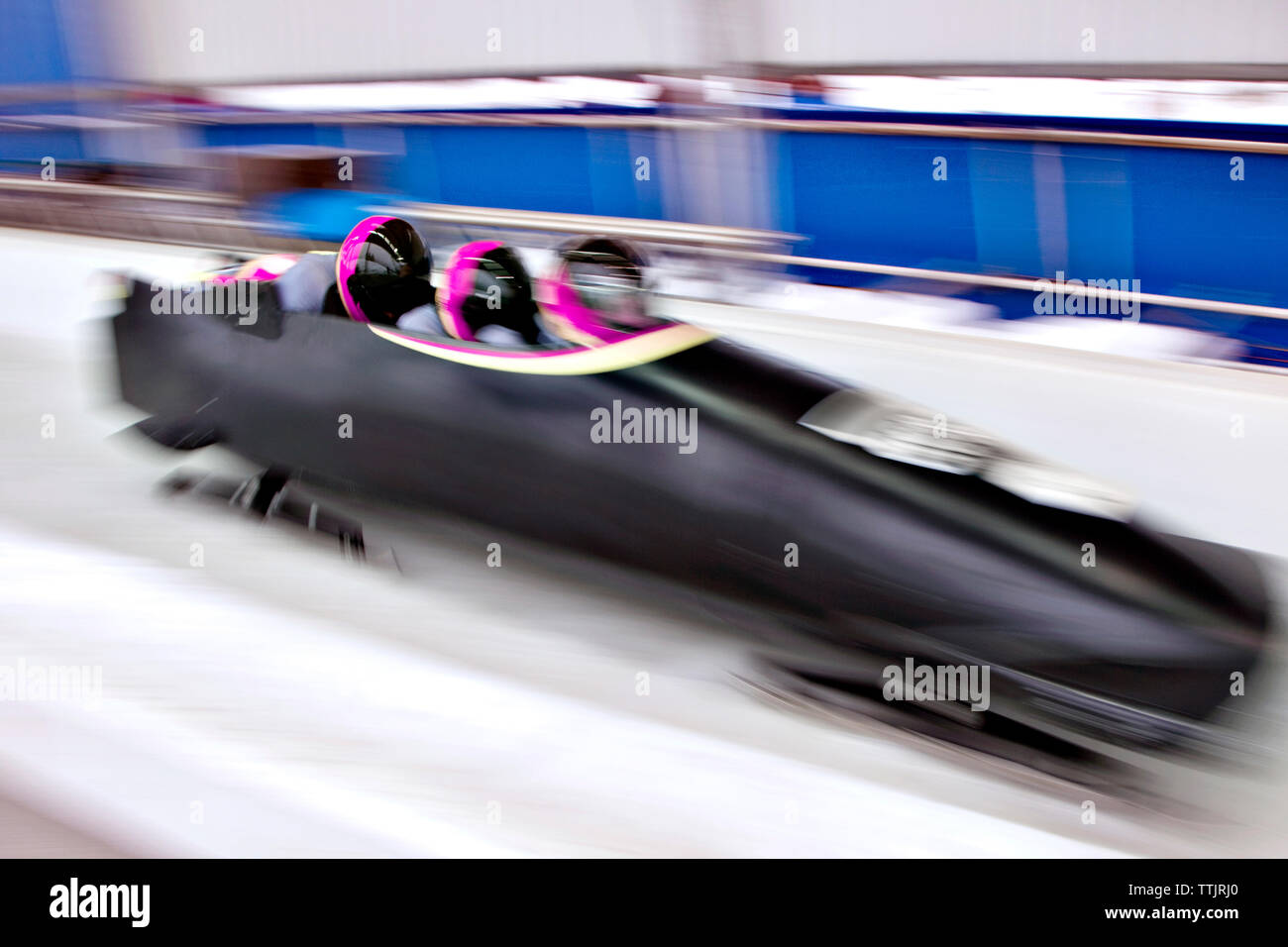Blurred motion of no bobsleigh team on track Stock Photo