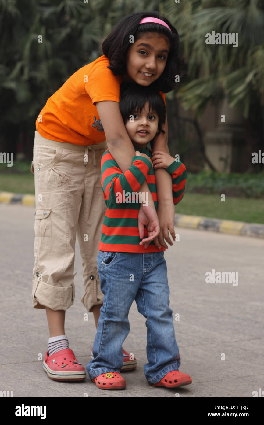 Portrait of two girls standing together Stock Photo - Alamy