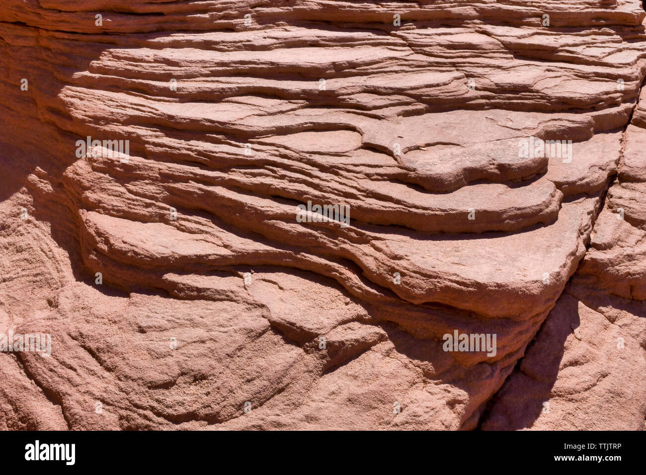 Desert rock with erosion layers showing Stock Photo Alamy