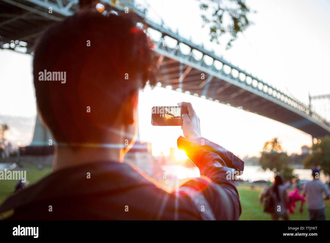 Old man phone rear view hi-res stock photography and images - Alamy
