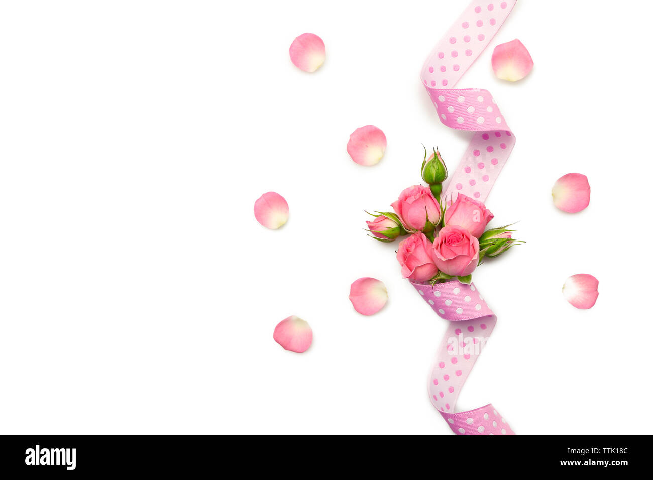 Pink ribbon with flowers. Wedding concept Stock Photo - Alamy