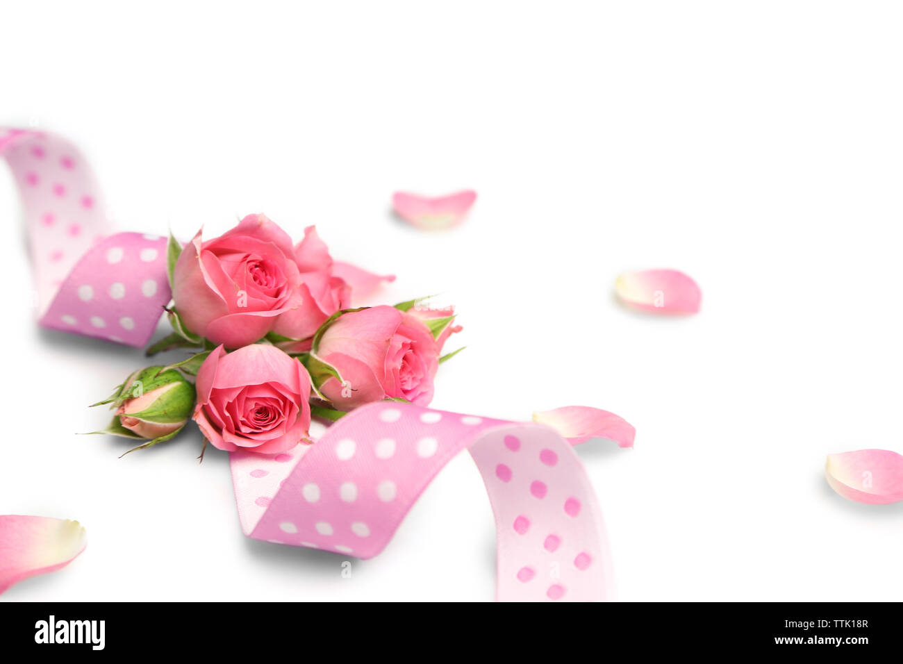 Pink ribbon with flowers. Wedding concept Stock Photo - Alamy