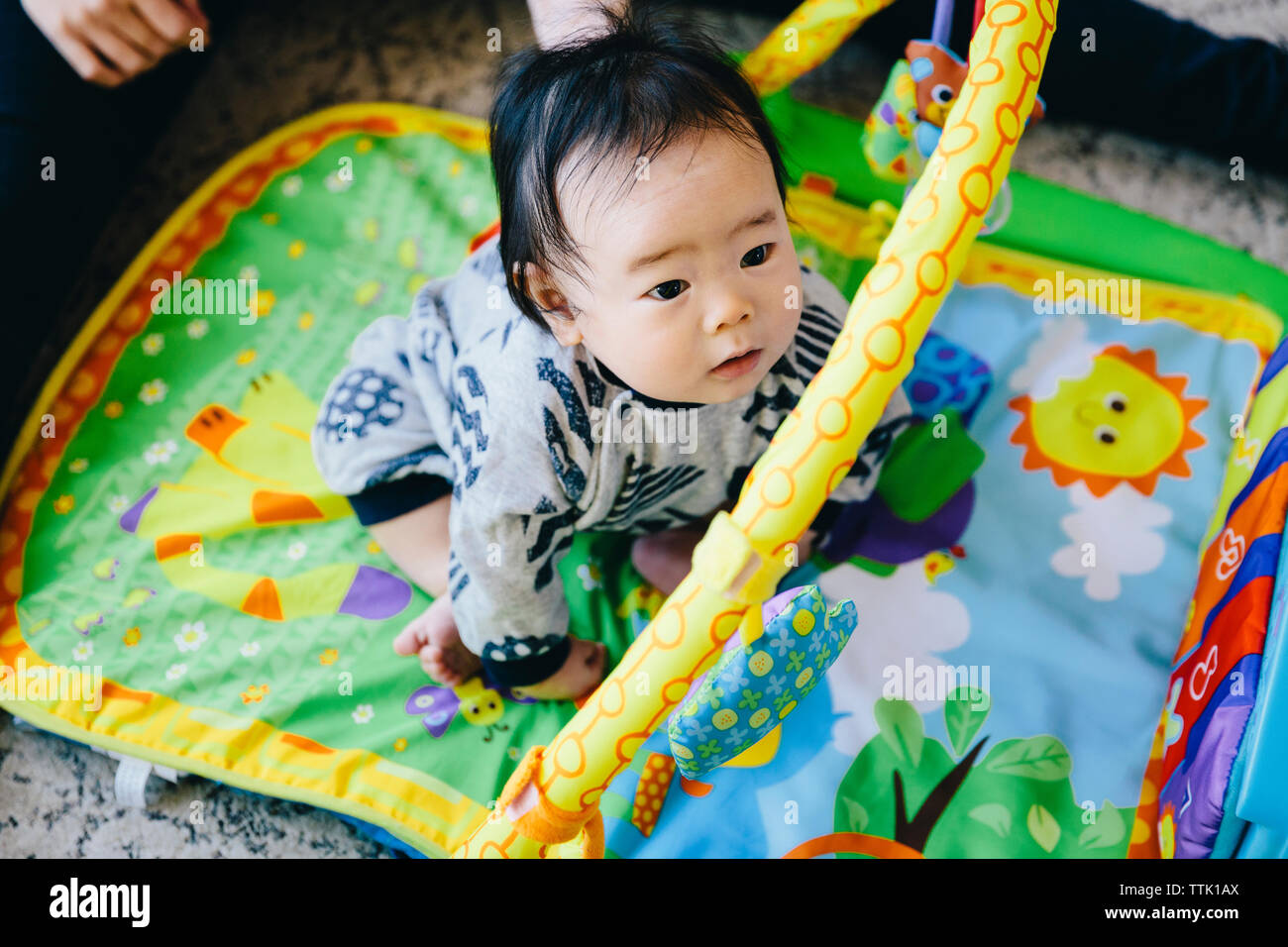 Boy sitting on bed hi-res stock photography and images - Alamy